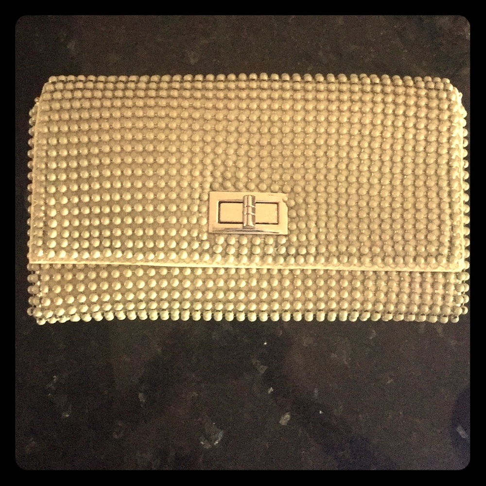 NWOT BCBG clutch.excellent condition. 10”x6”x1”